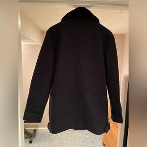 Bagatelle women’s black wool coat with faux fur collar.